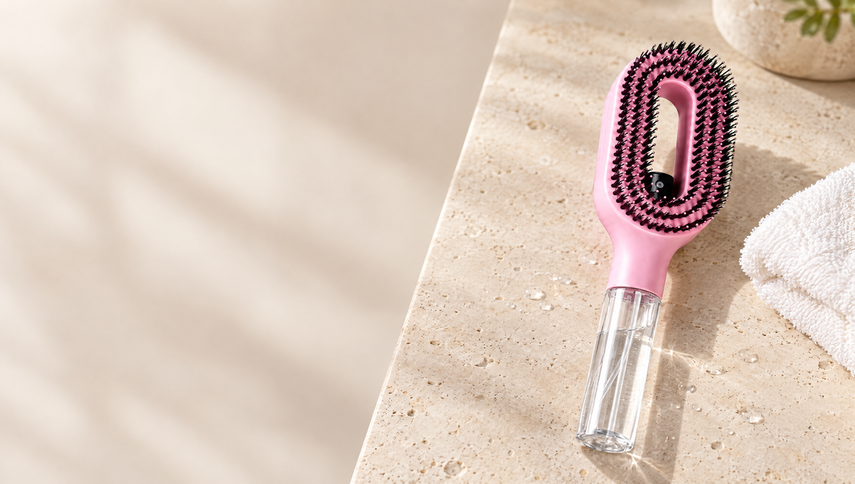Pink Halo Mist Brush on a bathroom counter